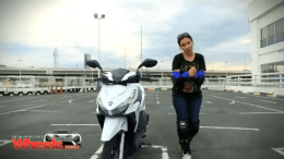 Angel rides a motorbike